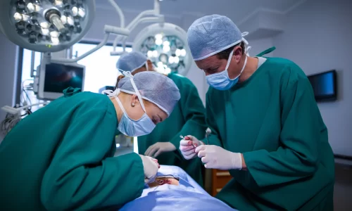surgeons-performing-operation-operation-theater